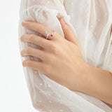 Säädettävä koirarengas tyttöhahmolla hopeassa.